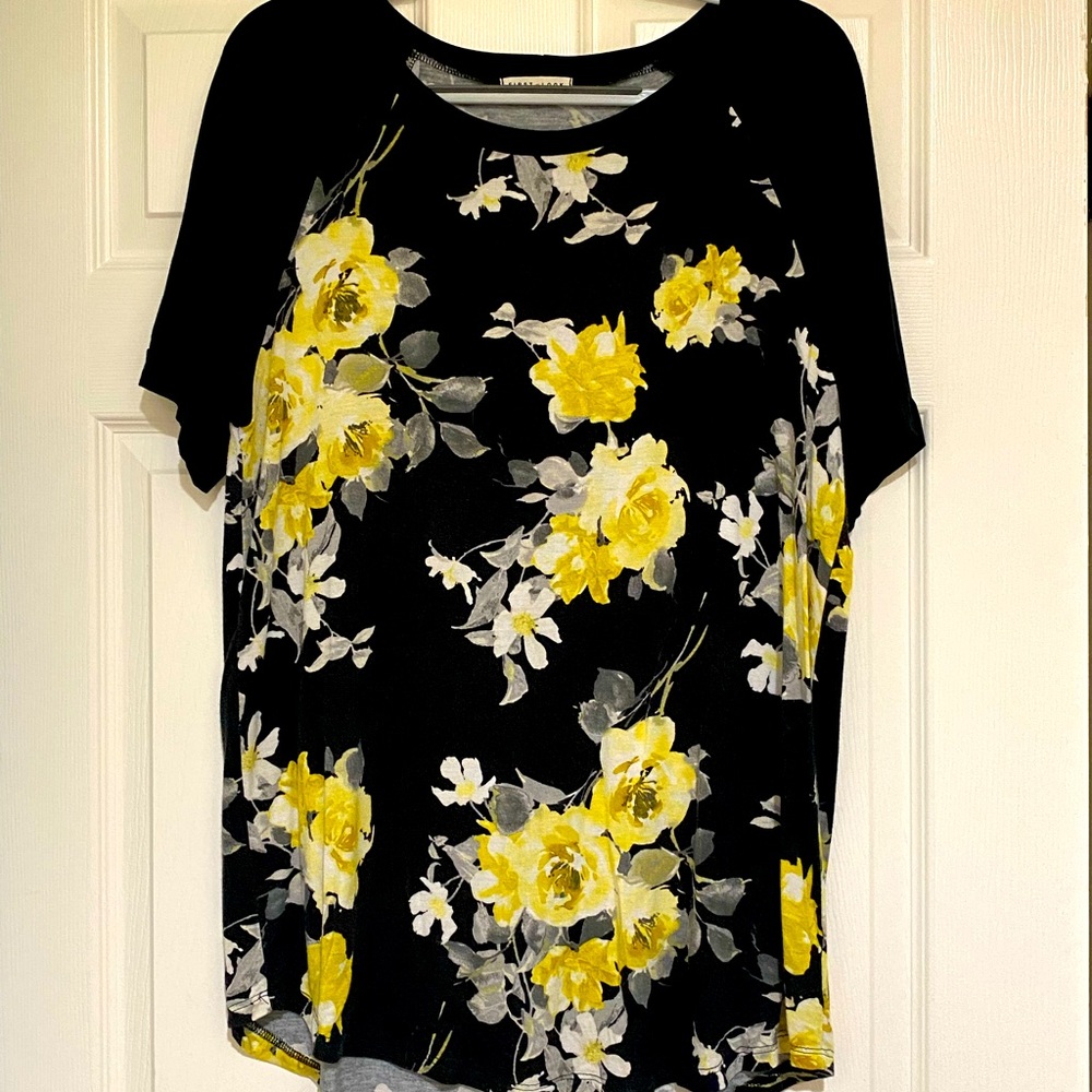Black top with yellow floral pattern